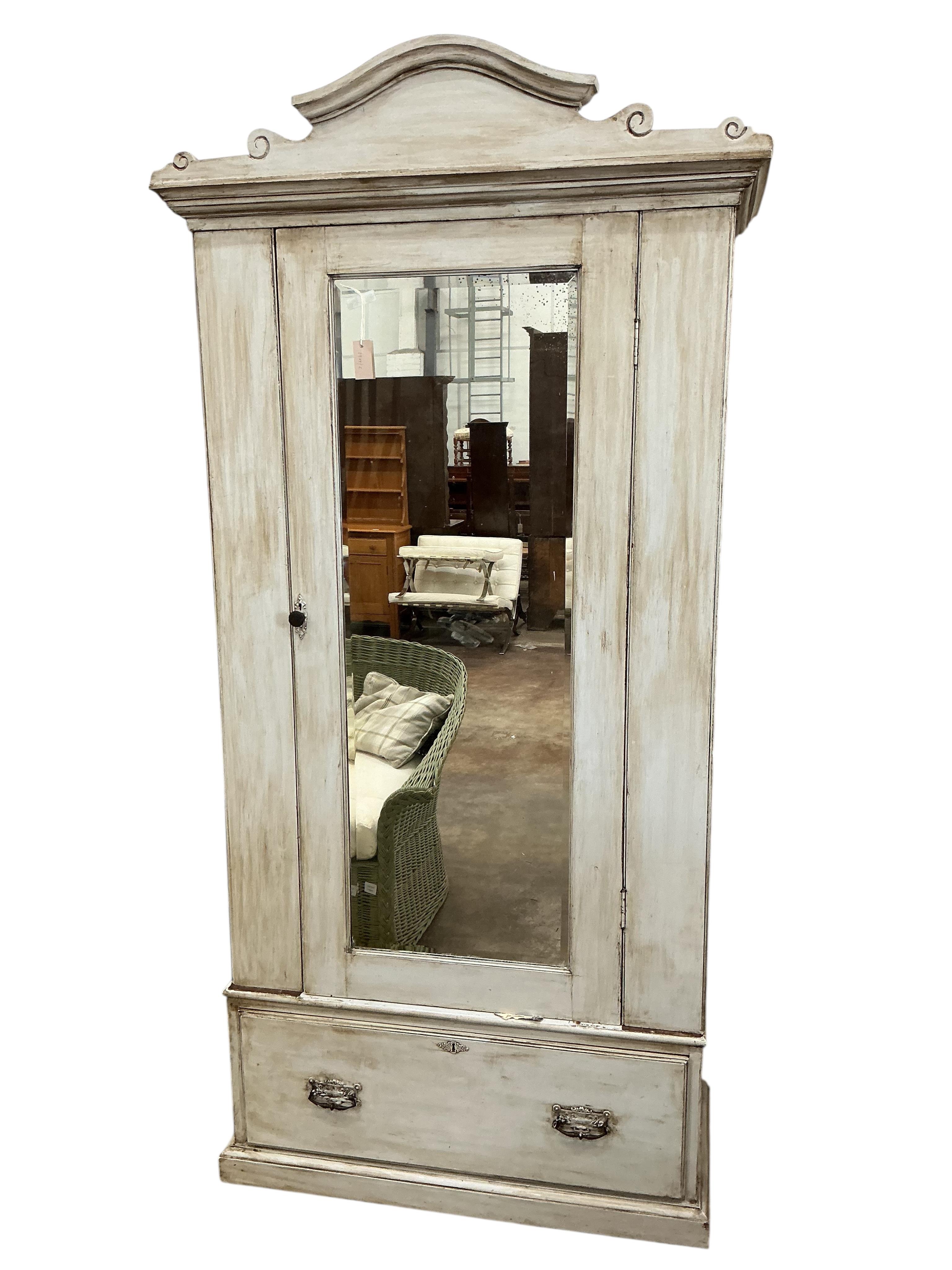 A wardrobe, later painted, width 112cm, depth 61cm, height 228cm
